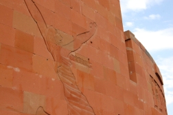 A woman representing revival on the rear of the memorial wall.